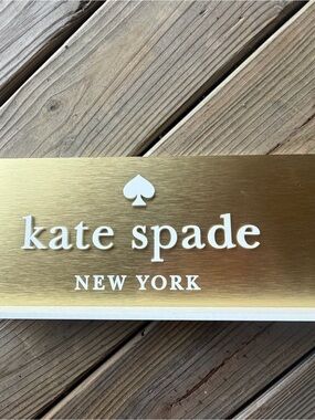 kate spade Gold and White Logo Plaque - New York